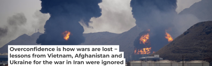 Plumes of smoke and fire rise after debris from an intercepted Iranian drone struck an oil facility, according to authorities, in Fujairah, United Arab Emirates, on March 14, 2026. AP Photo/Altaf Qadri